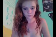 Redhead girl anal masturbating with glass dildo